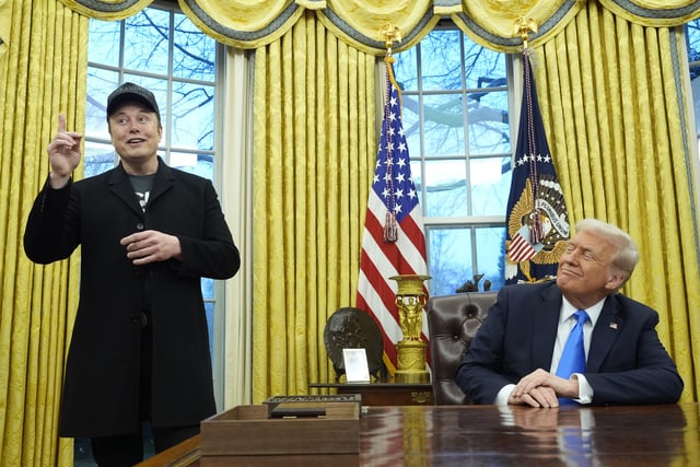 FILE - President Donald Trump listens as Elon Musk speaks in the Oval Office at the White House, Feb. 11, 2025, in Washington. (AP Photo/Alex Brandon, File)
