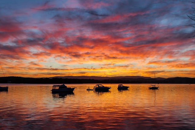 A man’s body has been found after hours of searching Lake Macquarie for a missing fisherman.