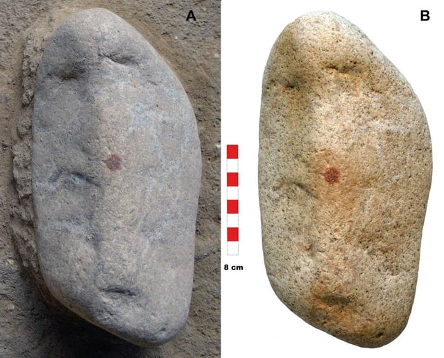 A. The object before being fully excavated; B. Once unearthed, it is possible to appreciate the three main cavities and the central position of the red dot.