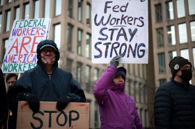 Protesters rally outside of the Theodore Roosevelt Federal Building headquarters of the U.S. Office of Personnel Management on Feb. 5, 2025 in Washington, D.C. (Photo by Alex Wong/Getty Images)