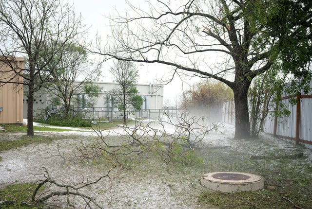 Hail remains on the ground on Heflin Lane in East Austin, Thursday, May 29, 2025, after a destructive storm Wednesday.