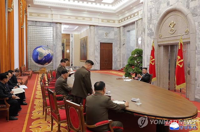 North Korean leader Kim Jong-un (R) presides over an enlarged meeting of the Central Military Commission of the ruling Workers' Party of Korea on May 28, 2025, in this photo carried by the North's official Korean Central News Agency. (For Use Only in the Republic of Korea. No Redistribution) (Yonhap)