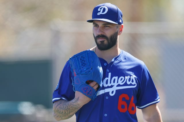 GLENDALE, ARIZONA - FEBRUARY 25: Tanner Scott #66 of the Los Angeles Dodgers walks on the field during spring training workouts at Camelback Ranch on February 25, 2025 in Glendale, Arizona. (Photo by Brandon Sloter/Getty Images)