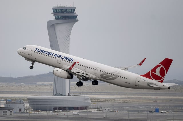 A Turkish Airlines Airbus A321 plane takes off in front of the control tower at Istanbul Airport on April 6, 2019, in Istanbul, Turkey. (Photo by OZAN KOSE/AFP via Getty Images)
