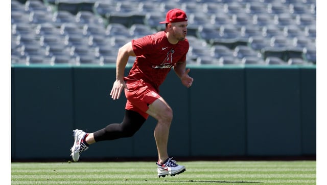 Angels star Mike Trout, shown warming up before a game against the Miami Marlins last week at Angel Stadium, is expected to be available when the team begins a road trip in Cleveland on Friday. Trout has been out since May 1 because of a bone bruise in his left knee. (Photo by Luke Hales/Getty Images)