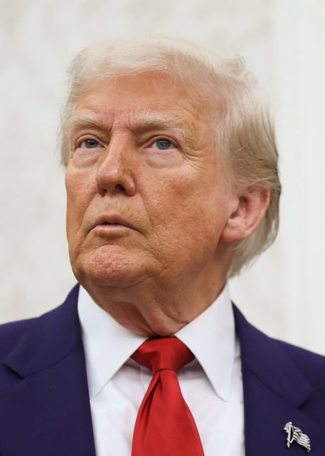 President Donald Trump looks on during a swearing-in ceremony for the interim U.S. Attorney for the District of Columbia, Jeanine Pirro, at the White House in Washington, D.C., U.S., May 28, 2025.