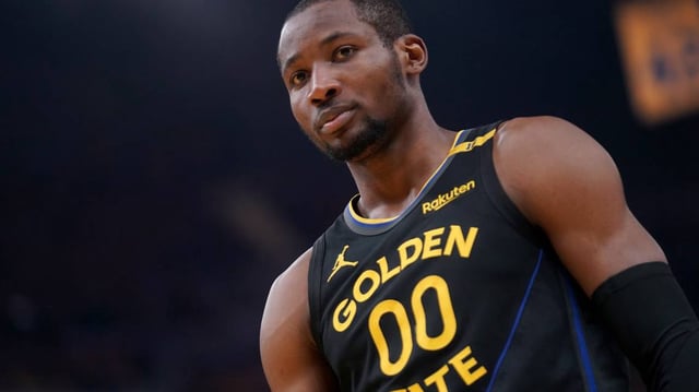 Golden State Warriors forward Jonathan Kuminga stands on the court against the Minnesota Timberwolves at Chase Center.