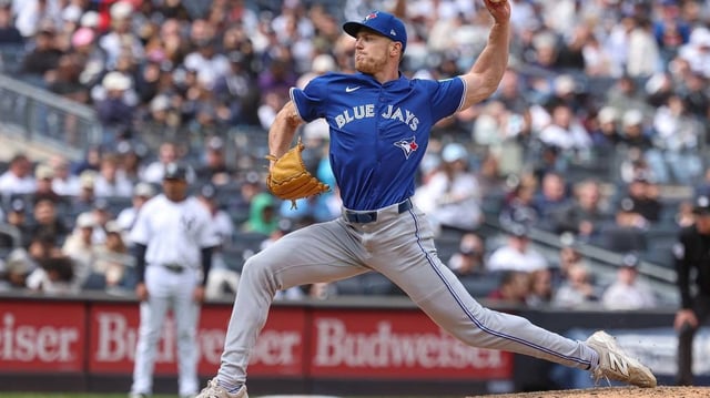 Apr 27, 2025; Bronx, New York, USA; Toronto Blue Jays relief pitcher Josh Walker (21) delivers a pitch during the seventh inning against the New York Yankees at Yankee Stadium. Mandatory Credit: Vincent Carchietta-Imagn Images