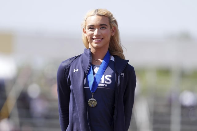 AB Hernandez of Jurupa Valley poses with a medal after winning the girls long jump during the CIF Southern Section Masters Meet at Moorpark High School, Saturday, May 24, 2025, in Moorpark, Calif. (Kirby Lee via AP)