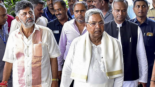 Karnataka chief minister Siddaramaiah, deputy chief minister DK Shivakumar, with Congress MLAs in Bengaluru. (PTI)