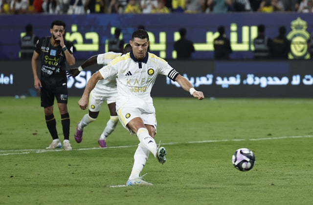 Soccer Football - Saudi Pro League - Al Nassr v Al Khaleej - Al-Awwal Park, Riyadh, Saudi Arabia - May 21, 2025 Al Nassr's Cristiano Ronaldo scores their second goal from the penalty spot. REUTERS/Hamad I Mohammed/File Photo