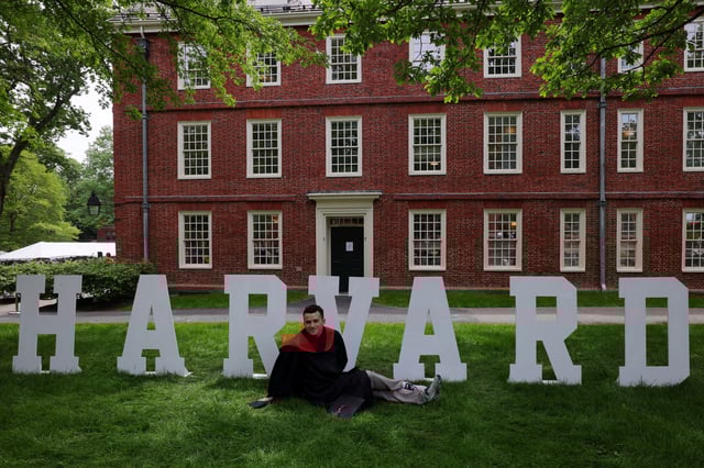 Graduating student Jordan Strasser poses for a photograph before Class Day Exercises, part of Harvard University?s 374th Commencement, in Cambridge, Massachusetts, U.S., May 28, 2025.   REUTERS/Brian Snyder