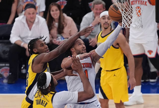 New York Knicks guard Jalen Brunson goes up for a shot against Indiana Pacers forward Aaron Nesmith and center Myles Turner during Game 5 of the NBA Eastern Conference Final in New York, on Thursday, May 29, 2025.