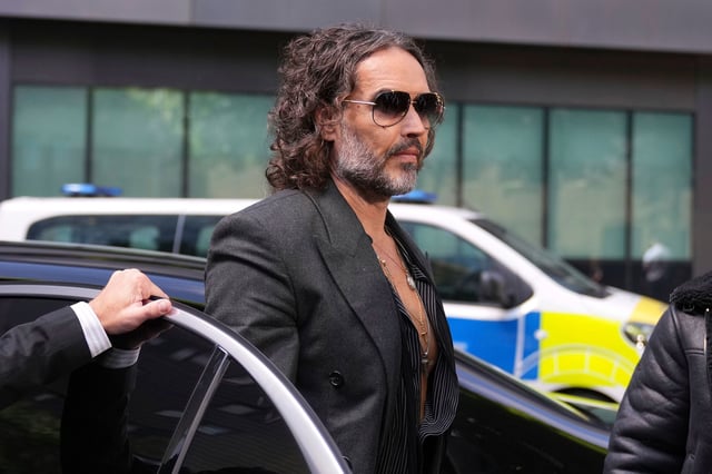 Russell Brand arrives at Southwark Crown Court in London, where he is charged with rape and sexual assault, on Friday.
