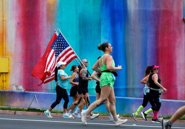 Runners make their way along University Avenue in North Park during the Rock ‘n’ Roll Marathon and Half Marathon on June 2, 2024, in San Diego. (K.C. Alfred / The San Diego Union-Tribune)