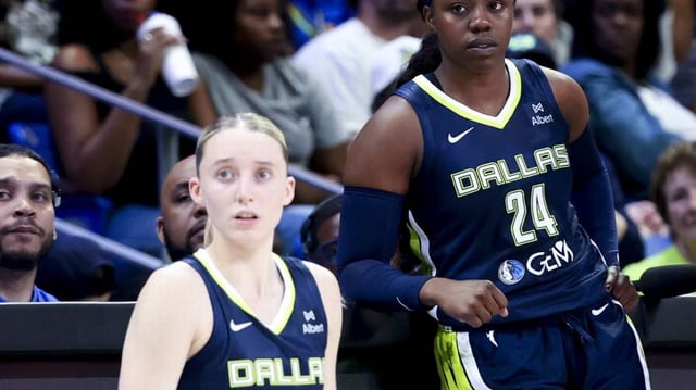 May 16, 2025; Arlington, Texas, USA; Dallas Wings guard Paige Bueckers (5) and Dallas Wings guard Arike Ogunbowale (24) and Dallas Wings head coach Chris Koclanes talk against the Minnesota Lynx during the first half at College Park Center. Mandatory Credit: Kevin Jairaj-Imagn Images