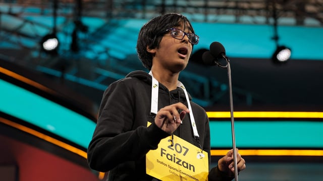 NATIONAL HARBOR, MARYLAND - MAY 29: Faizan Zaki, 13, of Dallas, Texas spells his word in the finals of the 2025 Scripps National Spelling Bee at the Gaylord National Resort and Convention Center on May 29, 2025 in National Harbor, Maryland. 243 spellers from all over the globe ages 8 to 14 competed from May 27 to May 30, 2025 and were narrowed down to 9 finalists during the 100th anniversary of the bee. Kayla Bartkowski/Getty Images/AFP (Photo by Kayla Bartkowski / GETTY IMAGES NORTH AMERICA / Getty Images via AFP)