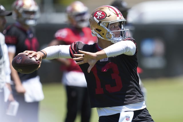 San Francisco 49ers quarterback Brock Purdy (13) passes during NFL football practice Thursday, May 29, 2025, in Santa Clara, Calif.. (AP Photo/Jeff Chiu)