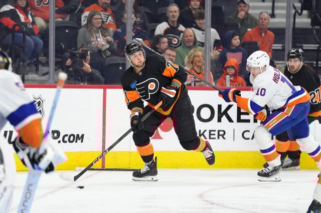 Apr 12, 2025; Philadelphia, Pennsylvania, USA; Philadelphia Flyers right wing Tyson Foerster (71) controls the puck against the New York Islanders in the second period at Wells Fargo Center. Mandatory Credit: Kyle Ross-Imagn Images/File Photo