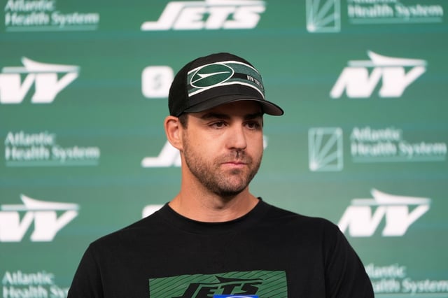 Tanner Engstrand, offensive coordinator for the New York Jets, talk to reporters before an NFL football practice in Florham Park, N.J., Thursday, May 29, 2025. (AP Photo/Seth Wenig)