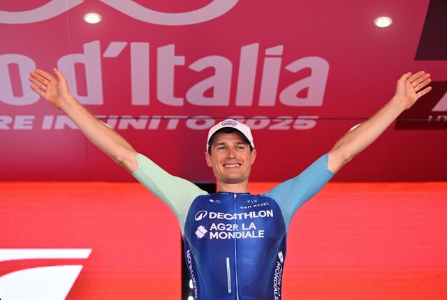 Cycling - Giro d'Italia - Stage 19 - Biella to Champoluc - Italy - May 30, 2025 Decathlon AG2R La Mondiale Team's Nicolas Prodhomme celebrates on the podium after winning stage 19 REUTERS/Jennifer Lorenzini