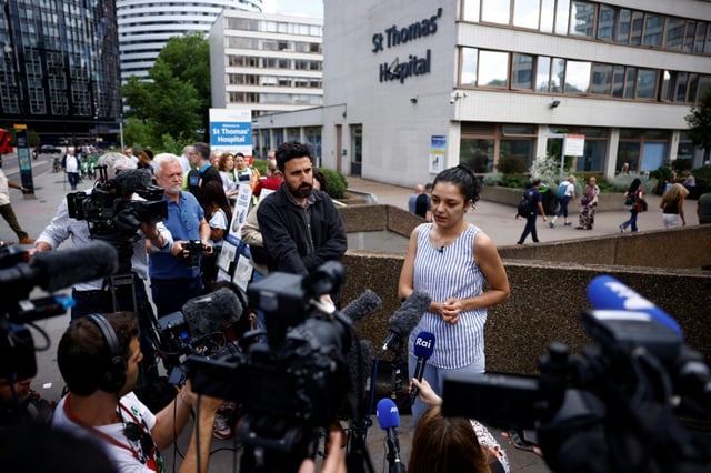 Sanaa Seif, sister of jailed activist Alaa Abdel Fattah, speaking to reporters outisde the London hospital where her mother was admitted amid her hunger strike