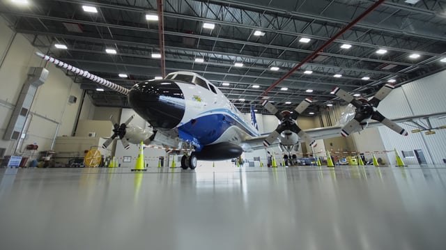 The Lockheed WP-3D Orion "Hurricane Hunter" aircraft is seen in a hangar at the NOAA Aircraft Operations Center Tuesday, May 6, 2025, in Lakeland, Fla. (AP Photo/John Raoux)
