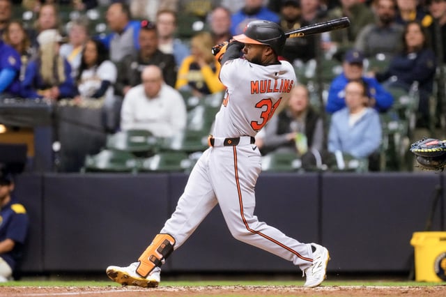 May 19, 2025; Milwaukee, Wisconsin, USA;  Baltimore Orioles center fielder Cedric Mullins (31) hits a home run during the seventh inning against the Milwaukee Brewers at American Family Field. Mandatory Credit: Jeff Hanisch-Imagn Images