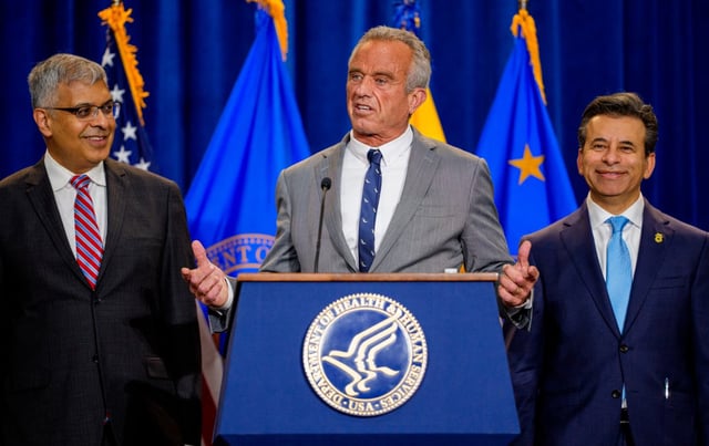 Health and Human Services Secretary Robert F. Kennedy Jr., accompanied by National Institutes of Health Director Jayanta Bhattacharya (L), and Food and Drug Administration Commissioner Marty Makary (R), speaks during a news conference at the Health and Human Services Department on April 22, 2025, in Washington, DC.