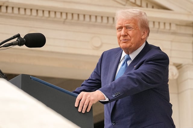 U.S. President Donald Trump delivers remarks at the annual National Memorial Day Observance in the Memorial Amphitheater at Arlington National Cemetery in Arlington, Virginia, U.S., May 26, 2025. REUTERS/Ken Cedeno/File Photo