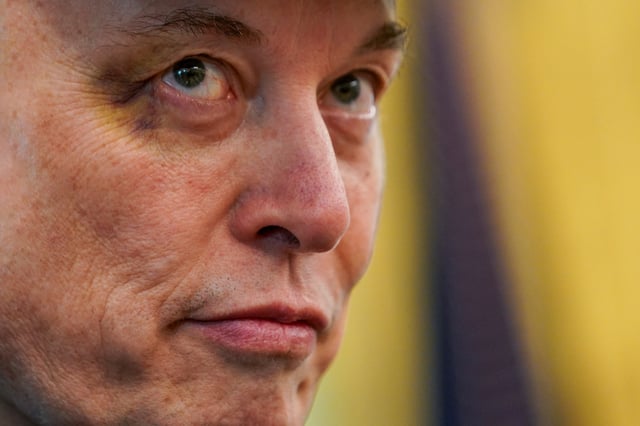 Elon Musk is seen with a bruised eye that Musk claimed he received at the hands of his son, X Æ A-12, as he attends a press conference with U.S. President Donald Trump in the Oval Office at the White House in Washington, D.C., U.S., May 30, 2025. REUTERS/Nathan Howard