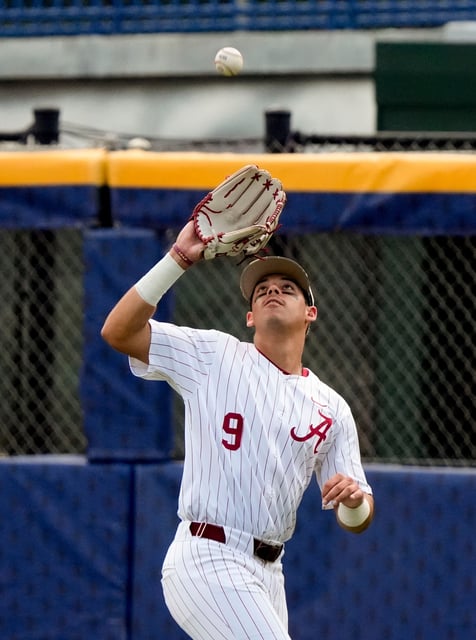 May 20, 2025; Hoover, AL, USA; Alabama outfielder Bryce Fowler (9) catches a fly to right during the game with Missouri in the first game of the SEC Baseball Tournament at the Hoover Met.