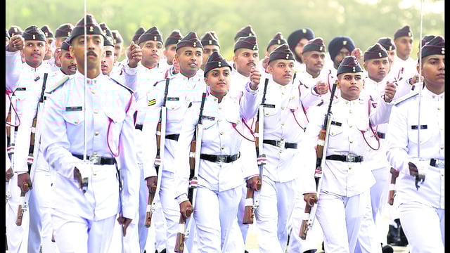The first batch of 17 female cadets marches alongside more than 300 male counterparts in a spectacular display of integration at the National Defence Academy (NDA) in Pune on Friday. (Mahendra Kolhe/HT photo)