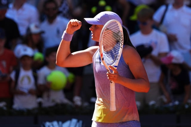 Poland’s Iga Swiatek reacts winning a point to Romania’s Jaqueline Cristian during their third round match of the French Tennis Open, at the Roland-Garros stadium, in Paris, Friday, May 30, 2025. (AP Photo/Lindsey Wasson)