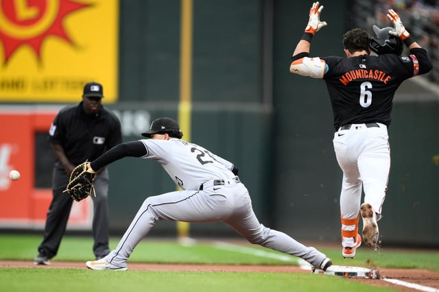Baltimore Orioles&#39; Ryan Mountcastle (6) is out at first against Chicago White Sox first baseman Miguel Vargas (20) during the inning of a baseball game, Friday, May 30, 2025, in Baltimore. (AP Photo/Nick Wass)