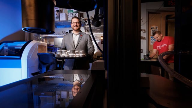 Eric Markvicka (left), Robert F. and Myrna L. Krohn Assistant Professor of Biomedical Engineering, along with graduate students Ethan Krings (right) and Patrick McManigal (not pictured), recently presented work on an intelligent, self-healing artificial muscle at the IEEE International Conference on Robotics and Automation.