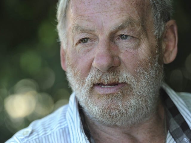 Ivan Henry, who spent 25 years in jail for rapes he did not commit, is suing for compensation. Henry is pictured in North Vancouver, BC Tuesday, July 8, 2014.