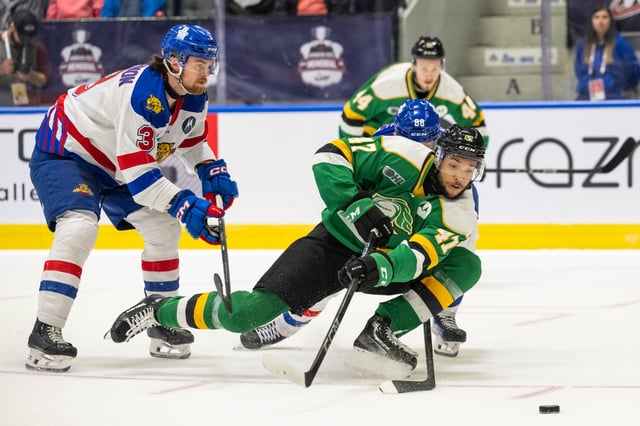 PHOTO COURTESY VINCENT ETHIER/CHL London Knights forward Blake Montgomery swipes at a puck while falling during the Knights' 5-2 semifinals win Friday over the Moncton Wildcats at the Memorial Cup hosted in Rimouski, Que.