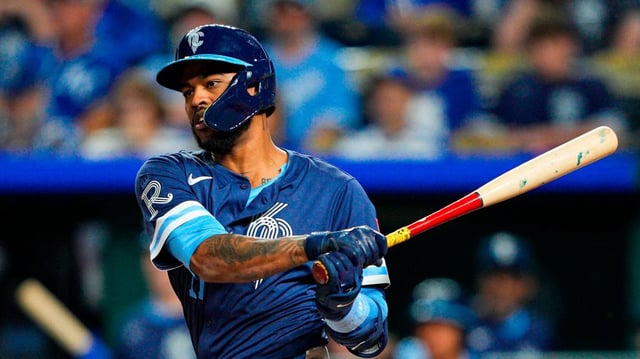 Kansas City Royals third baseman Maikel Garcia (11) hits a triple during the seventh inning against the Detroit Tigers at Kauffman Stadium on May 30, 2025.
