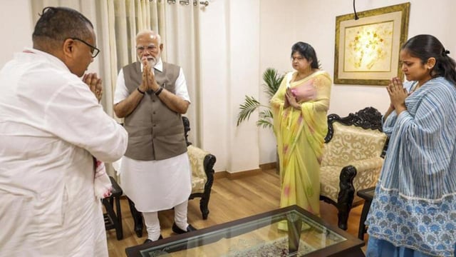 Prime Minister Narendra Modi meets family members of Shubham Dwivedi in Kanpur on Friday. (ANI PHOTO)