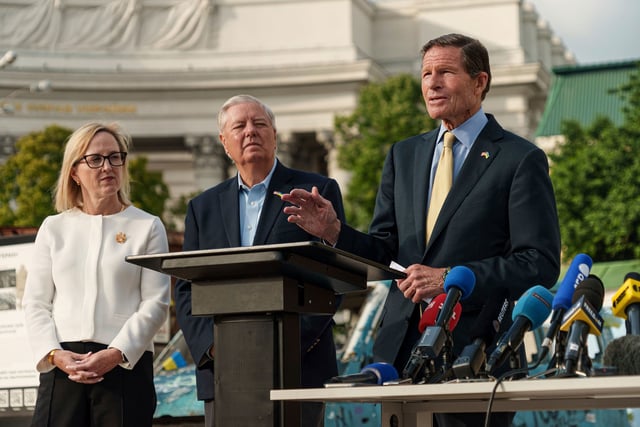 Sen. Lindsey Graham (center) and Sen. Richard Blumenthal (right) speak during a press conference in Kyiv, Ukraine, on May 30, 2025.