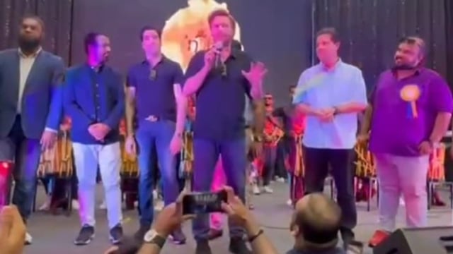 As former Pakistani cricketers Shahid Afridi and Umar Gul arrived, the community members paused their cultural performance and broke into chants of “Boom Boom.