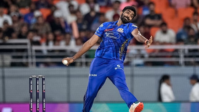 Mumbai Indians' Jasprit Bumrah bowls during the Indian Premier League (IPL) Twenty20 Eliminator cricket match between Gujarat Titans and Mumbai Indians