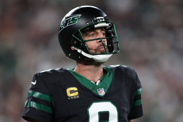 Aaron Rodgers #8 of the New York Jets looks on during the third quarter against the Houston Texans at MetLife Stadium on October 31, 2024 in East Rutherford, New Jersey.