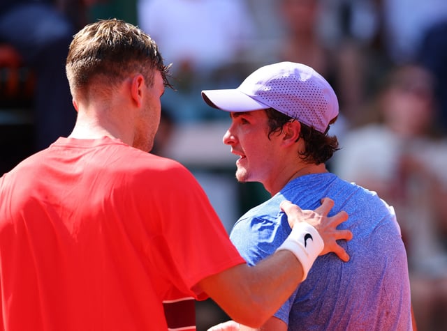 Tennis - French Open - Roland Garros, Paris, France - May 31, 2025 Britain's Jack Draper shakes hands with Brazil's Joao Fonseca after winning his third round match REUTERS/Denis Balibouse