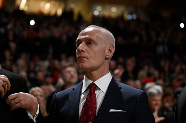 FILE - Big 12 Commissioner Brett Yormark stands on the sideline before an NCAA college basketball game between Texas Tech and Houston Monday, Feb. 24, 2025, in Lubbock, Texas. (AP Photo/Justin Rex, File)