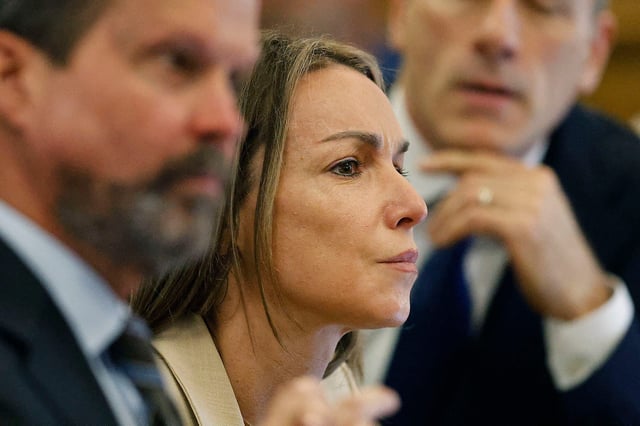 Karen Read listens to the cross examination by Robert Alessi of expert accident witness Dr. Judson Welcher while seated at the defense table with her attorneys Alan Jackson and David Yannetti
Day 22 of the Karen Read murder trial at Norfolk Superior Court in Dedham Massachusetts on Wednesday May 28, 2025.
Pool photo Greg Derr/Patriot Ledger