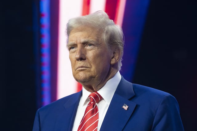 U.S. President-elect Donald Trump looks on during Turning Point USA&#39;s AmericaFest at the Phoenix Convention Center on December 22, 2024 in Phoenix, Arizona.