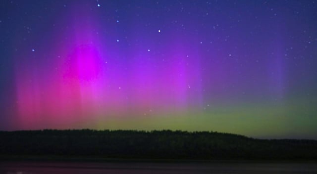 Aurora borealis, or northern lights, shine in the sky on August 12, 2024 in Mohe, Heilongjiang Province of China