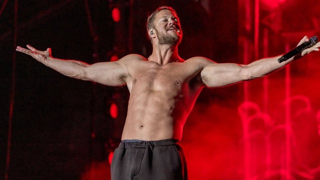 Imagine Dragons sparked debate online after waving a Palestinian flag during Milan show
